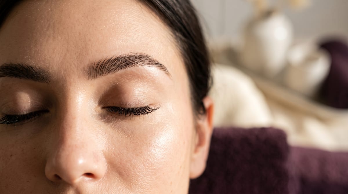 Brow shaping treatment in progress at QST Esthetics, a women only spa in Orléans, Ottawa